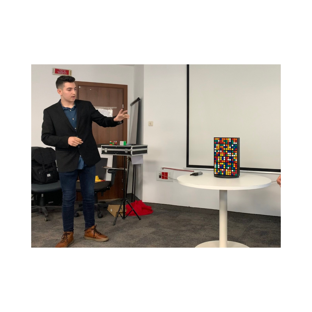 Matan-Shmueli-with-a-cube.png